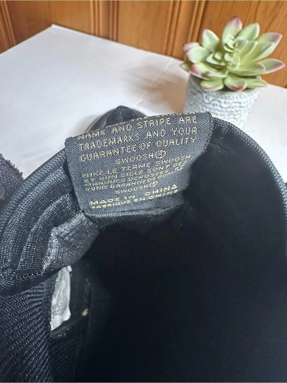 Nike Air High-Top Sneakers in Black with Gold Logo